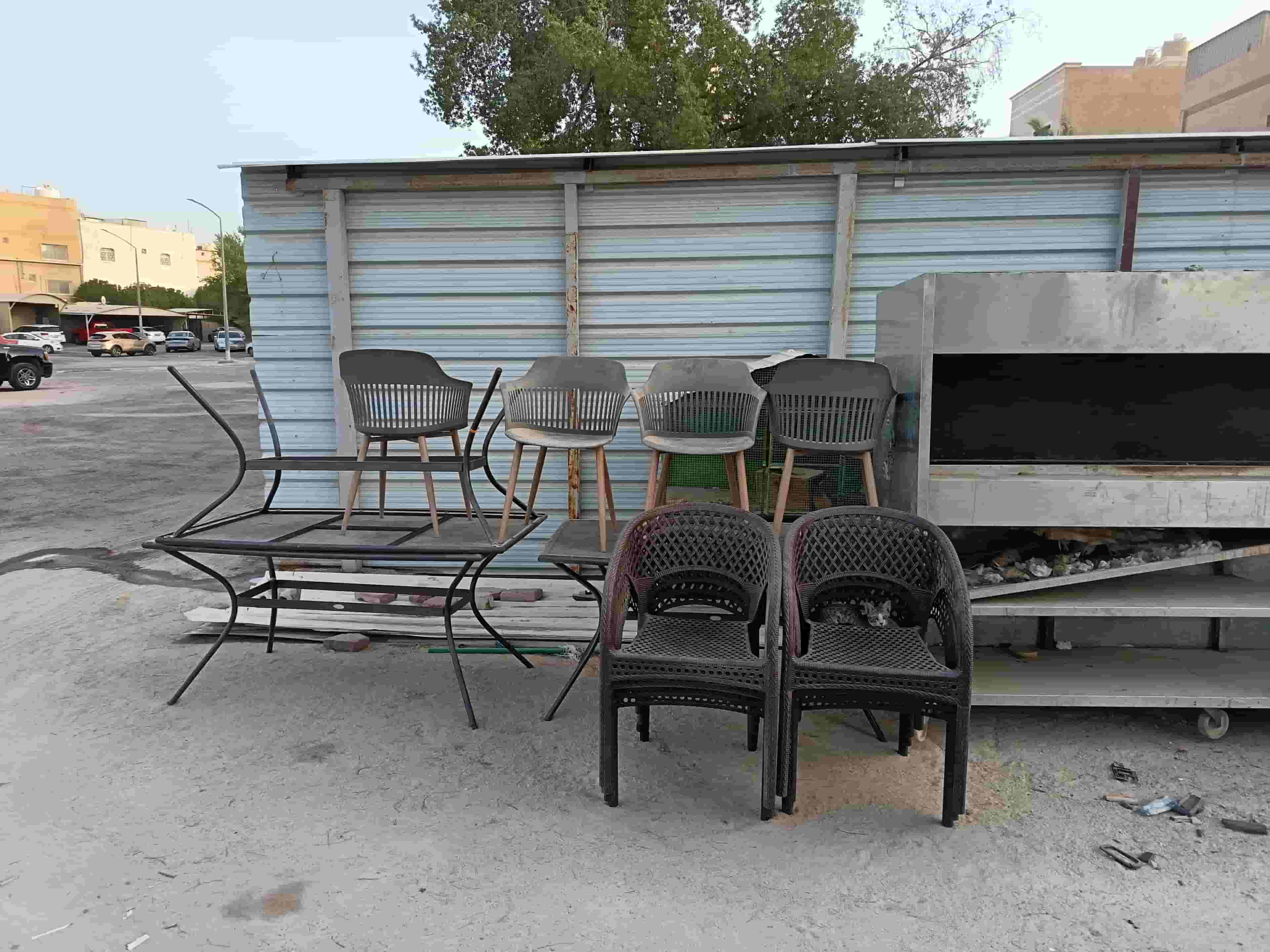 Portable charcoal grill on large wheels